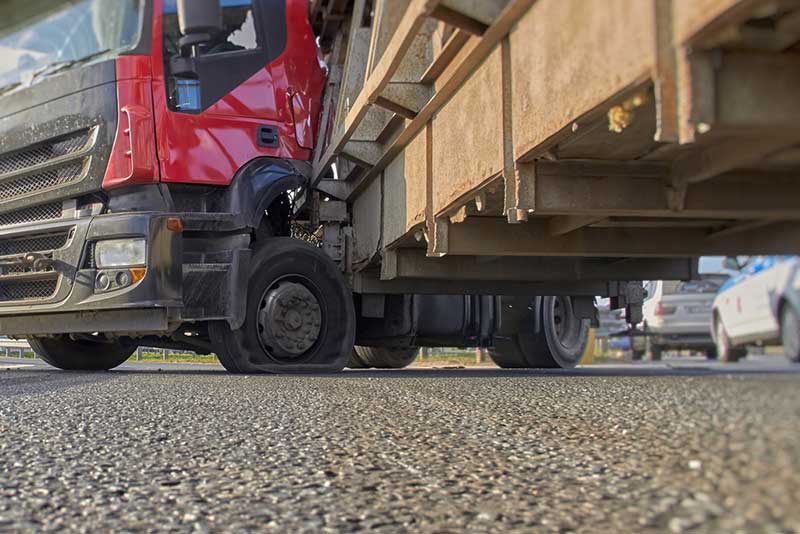 damaged big rig damaged red big rig due to accident