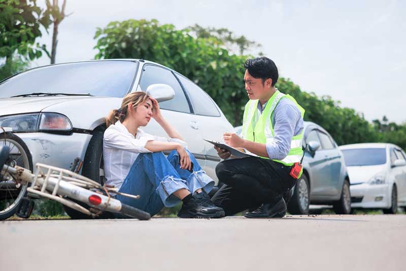 cyclist being interviewed injured cyclist being interviewed