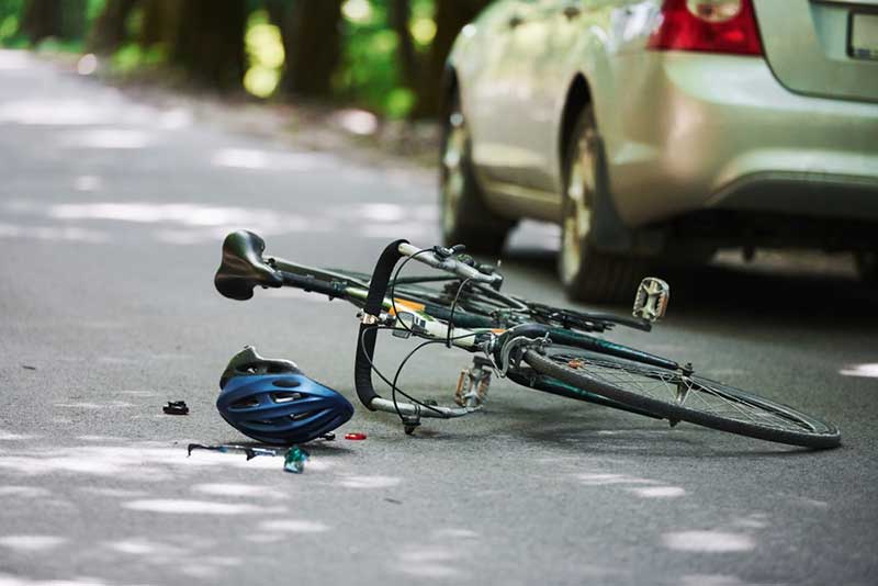 bicycle and helmet on the road bicycle and helmet on the road