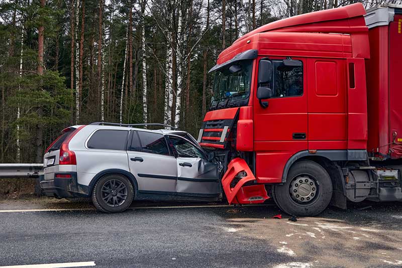 red truck and gray car crash
